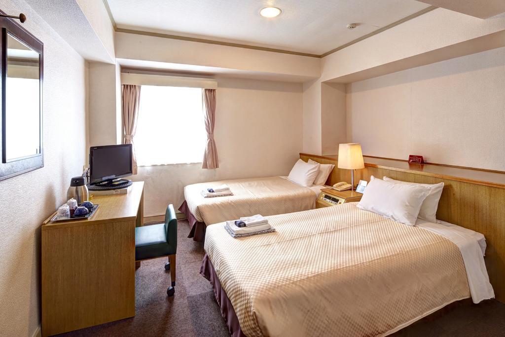 Okinawa Sun Plaza Hotel Naha Exterior photo